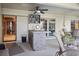 Covered patio featuring a wet bar, ceiling fan, outdoor furniture, and sliding glass doors at 3416 Fairfield Trl, Clearwater, FL 33761