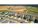 A dynamic aerial view showcasing the home's setting within a vibrant and growing community at 35320 Spruce Knob Ct, Dade City, FL 33525