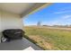 Outdoor patio with a grill and expansive views at 35320 Spruce Knob Ct, Dade City, FL 33525