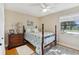 Bedroom featuring a full-sized bed and neutral colored walls at 3807 Lake Joyce Dr, Land O Lakes, FL 34639