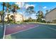 Outdoor basketball court with hoop and painted surface, great for sports and recreation at 4006 Crockers Lake Blvd # 212, Sarasota, FL 34238
