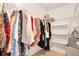 Spacious walk-in closet with ample hanging space and shelving for organized clothing and accessory storage at 4006 Crockers Lake Blvd # 212, Sarasota, FL 34238