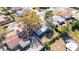 Aerial view of the property with the house, yard, and surrounding neighborhood at 4111 Moog Rd, Holiday, FL 34691