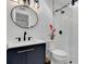 Stylish bathroom with a modern vanity, elegant fixtures, and a glass-enclosed shower for a luxurious feel at 423 62Nd St, Holmes Beach, FL 34217