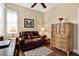 Comfortable home office with hardwood floors, area rug and lots of natural light at 4813 Michelle Ln, Palm Harbor, FL 34684