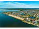 Gorgeous aerial view of waterfront properties along canals, offering boating access and stunning ocean views at 5241 West Shore Dr, New Port Richey, FL 34652
