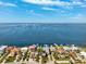 Waterfront homes boast private docks and stunning views of the tranquil bay at 5241 West Shore Dr, New Port Richey, FL 34652