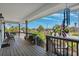 Scenic balcony providing serene views of the neighborhood, perfect for relaxing and enjoying the outdoors at 5241 West Shore Dr, New Port Richey, FL 34652