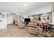 Spacious basement area with tile flooring, comfortable chairs, and ample storage at 5241 West Shore Dr, New Port Richey, FL 34652