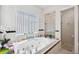 Bright bathroom features an oversized soaking tub at 5241 West Shore Dr, New Port Richey, FL 34652