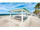 Enjoy shaded picnic areas and breathtaking ocean views on the sandy beach at 5241 West Shore Dr, New Port Richey, FL 34652
