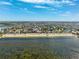 A beautiful beach with crystal-clear water and soft sand, perfect for relaxation at 5241 West Shore Dr, New Port Richey, FL 34652