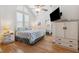 Charming bedroom with natural light and a decorative ceiling fan at 5241 West Shore Dr, New Port Richey, FL 34652