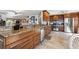 Spacious kitchen with granite counters, stainless appliances, and ample cabinet space for storage at 5241 West Shore Dr, New Port Richey, FL 34652