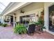 Comfortable patio is decorated with outdoor seating and beautiful landscaping views at 6209 Cypress Bend Ct, Bradenton, FL 34201