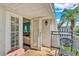 Inviting balcony featuring outdoor seating and panoramic views of the community at 702 Lyndhurst St # 823, Dunedin, FL 34698