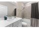 Contemporary bathroom features a stylish vanity with modern fixtures and bathtub at 7096 Heron Walk Ln, Wesley Chapel, FL 33545