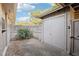 Enclosed backyard with storage shed and fence offering privacy and additional storage at 8001 Jasmine Dr # 8001, Temple Terrace, FL 33637