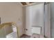 Outdated bathroom with toilet, shower and mirror at 1001 Pearce Dr # 106, Clearwater, FL 33764