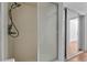 The shower features a mounted shower head with sliding doors at 1001 Pearce Dr # 106, Clearwater, FL 33764