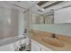 Outdated bathroom with tub, shower and sink at 1001 Pearce Dr # 106, Clearwater, FL 33764