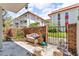 Exterior view of the apartments with red roofs and brick fence at 1001 Pearce Dr # 106, Clearwater, FL 33764