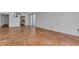 Spacious living room featuring terracotta tile floors and natural light from the sliding doors at 1001 Pearce Dr # 106, Clearwater, FL 33764