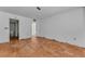 Spacious living room featuring tile floors and access to bathroom and other rooms at 1001 Pearce Dr # 106, Clearwater, FL 33764