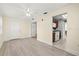 Inviting living room featuring neutral walls, wood-look floors, and a ceiling fan for added comfort at 10038 62Nd N Ter # 1, St Petersburg, FL 33708
