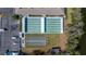 Aerial view of shuffleboard courts and bocce ball courts near the lake at 10038 62Nd N Ter # 1, St Petersburg, FL 33708