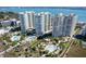 Luxurious coastal resort with multiple high-rise condos, swimming pools, and lush tropical landscaping at 1200 Gulf Blvd # 902, Clearwater Beach, FL 33767