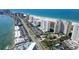 Scenic coastal community featuring high-rise buildings, a sandy beach, and a vibrant cityscape at 1200 Gulf Blvd # 902, Clearwater Beach, FL 33767