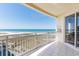 Enjoy breathtaking ocean views from this spacious balcony with white tile flooring and metal railing at 1200 Gulf Blvd # 902, Clearwater Beach, FL 33767