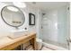 Modern bathroom featuring walk-in glass shower, stylish vanity, and elegant fixtures at 1200 Gulf Blvd # 902, Clearwater Beach, FL 33767