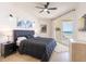 Cozy bedroom with calming decor and a private balcony overlooking the ocean at 1200 Gulf Blvd # 902, Clearwater Beach, FL 33767