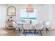 Bright dining area featuring a beach view, modern lighting, and stylish decor at 1200 Gulf Blvd # 902, Clearwater Beach, FL 33767