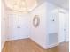 Bright entryway featuring neutral decor, tile floors, and modern light fixtures at 1200 Gulf Blvd # 902, Clearwater Beach, FL 33767
