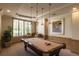 Well-lit game room featuring a pool table and comfortable seating area at 1200 Gulf Blvd # 902, Clearwater Beach, FL 33767