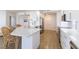 Updated kitchen with stainless appliances, quartz countertops, and bar seating at 1200 Gulf Blvd # 902, Clearwater Beach, FL 33767