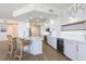 Sleek, modern kitchen with stainless steel appliances and quartz countertops at 1200 Gulf Blvd # 902, Clearwater Beach, FL 33767