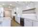 Modern kitchen with stainless steel appliances, bar area, and plenty of counter space at 1200 Gulf Blvd # 902, Clearwater Beach, FL 33767