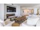 Inviting living room with sleek fireplace, comfortable seating, and natural light at 1200 Gulf Blvd # 902, Clearwater Beach, FL 33767