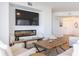 Comfortable living space with sleek fireplace and mounted flat screen TV at 1200 Gulf Blvd # 902, Clearwater Beach, FL 33767