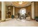 Elegant lobby with marble floors, wood paneled walls, comfortable seating, and decorative plants creating a luxurious ambiance at 1200 Gulf Blvd # 902, Clearwater Beach, FL 33767