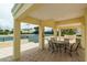 Outdoor seating area overlooking the tennis court and lush landscaping at 1200 Gulf Blvd # 902, Clearwater Beach, FL 33767