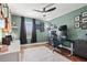 Bedroom with hardwood floors, neutral paint, and a ceiling fan at 12225 Lake Blvd, New Port Richey, FL 34655