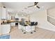 Modern kitchen with a large center island, granite countertops, stainless steel appliances, and tiled flooring at 12225 Lake Blvd, New Port Richey, FL 34655