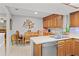 Cozy kitchen area with dining table and cabinetry providing ample storage at 13140 Village Chase Cir # 13140, Tampa, FL 33618
