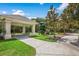 Shaded playground with picnic tables and playground equipment, offering a great space for outdoor fun at 14841 Tudor Chase Dr, Tampa, FL 33626