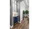 Stylish wine bar featuring custom cabinetry, wine fridge, and elegant finishes at 14841 Tudor Chase Dr, Tampa, FL 33626